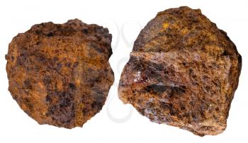 macro shooting of specimen natural rock - two pieces brown limonite (bog iron ore) mineral stone isolated on white background
