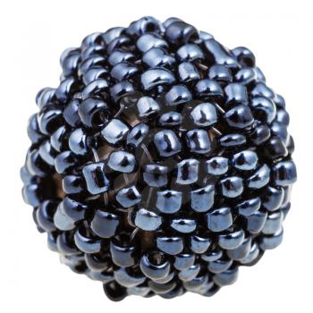 beadwork - ball from many sewn black glass beads close up isolated on white background