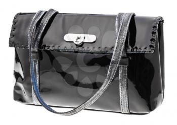 female handbag from black patent leather isolated on white background