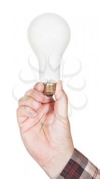 hand holds big incandescent lamp isolated on white background