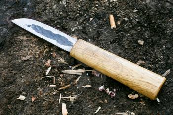 traditional hunting yakutian knife lying on ground