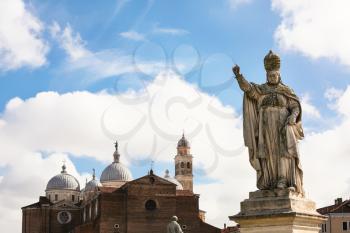 travel to Italy - statue Papa Clemente XIII (Carlo Rezzonico) and Basilica of Santa Giustina in Padua