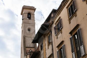 travel to Italy - bell tower of Church Chiesa dei Santi Michele e Gaetanoover old houses in Florence city