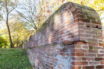 travel to Italy - old brick medieval wall of the ex papal fortress in Ferrara city