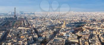 travel to France - Paris city skyline with Eiffel Tower and palace Les Invalides in winter twilight from Tour Maine - Montparnasse (Montparnasse Tower)