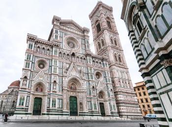 travel to Italy - view of Florence Duomo Cathedral (Cattedrale Santa Maria del Fiore, Cathedral of Saint Mary of the Flowers) and Giotto's Campanile from Baptistery on Piazza San Giovanni in morning