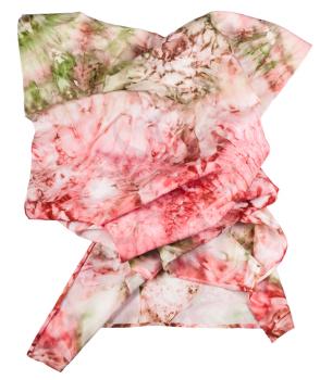 wrinkled silk scarf with abstract pink and green ornament hand painted in nodular technique isolated on white background