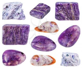 collection of various tumbled and raw charoite mineral stones isolated on white background