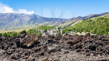 travel to Italy - petrified lava on slope of Etna volcano in Sicily