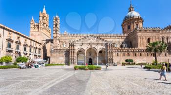 PALERMO, ITALY - JUNE 24, 2011: people on square and front view of Palermo Cathedral. It is the cathedral church of Roman Catholic Archdiocese of Palermo dedicated to the Assumption of the Virgin Mary