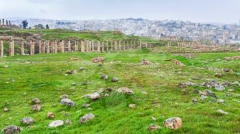 Travel to Middle East country Kingdom of Jordan - view of columns of Cardo Maximus street in ancient Gerasa town and Jerash city in winter