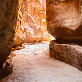 Travel to Middle East country Kingdom of Jordan - Al Siq passage in gorge to ancient Petra city in winter