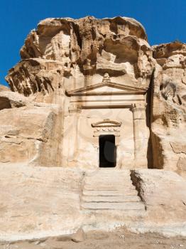 Travel to Middle East country Kingdom of Jordan - ancient tomb in Little Petra town (Siq al-Barid station) in winter