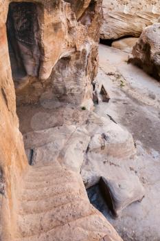 Travel to Middle East country Kingdom of Jordan - ancient cave houses in Little Petra town (Siq al-Barid station) in winter