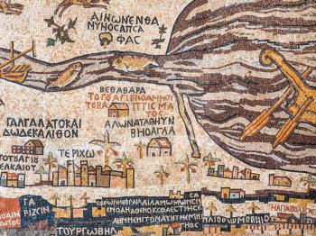 DEAD SEA, JORDAN - FEBRUARY 19, 2012: modern replica of ancient Madaba map. Madaba Mosaic Map is part of floor mosaic in old Byzantine church of Saint George, it dates to the 6th century AD