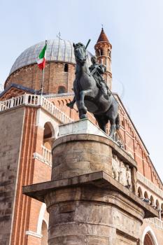 travel to Italy - The Equestrian Statue of Gattamelata by Donatello and Basilica of Saint Anthony of Padua on square piazza del Santo in Padua city
