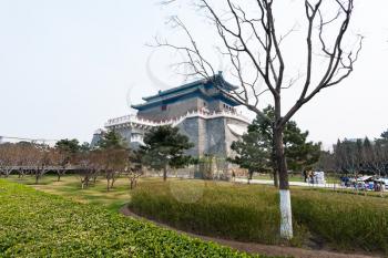 travel to China - public park and view of Arrow Tower (Jian Lou, Jianlou, Zhengyangmen Gate) in Beijing in spring. The tower is the ancient building situated on Tiananmen Square