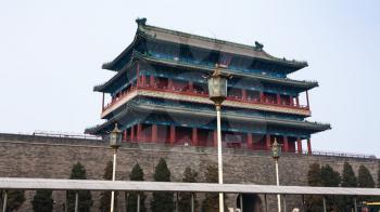 travel to China - view of Zhengyangmen Gate tower in Beijing in spring. The tower is historic city gate that is located at the south end of Tiananamen Square