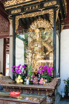 GUANGZHOU, CHINA - APRIL 1, 2017: god sculpture in court of Guangxiao Temple (Bright Obedience, Bright Filial Piety Temple). This is is one of the oldest Buddhist temples in Guangzhou city