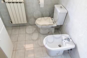 indoor of typical white modern toilet room