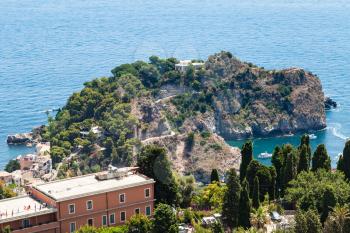 travel to Sicily, Italy - above view of cape near Isola Bella island in Ionian Sea from Taormina city in summer day