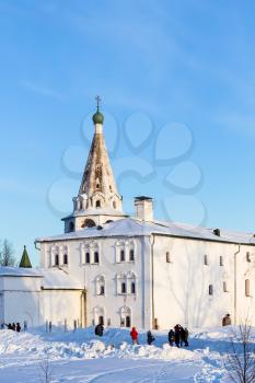 tourist near Bishops Chambers palace in Suzdal Kremlin in winter day in Vladimir oblast of Russia