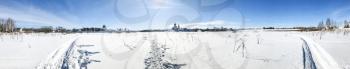 panorama of frozen in river Suzdal town with Kremlin and churches in winter in Vladimir oblast of Russia