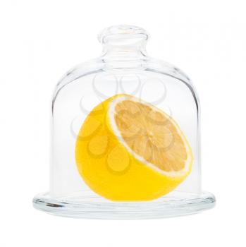 half of yellow lemon in Glass Lemon Keeper isolated on white background