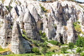 Travel to Turkey - rock-cut ancient monastic settlement in fairy chimneys rocks near Goreme town in Cappadocia in spring