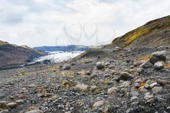 travel to Iceland - volcanic valley and Solheimajokull glacier (South glacial tongue of Myrdalsjokull ice cap) in Katla Geopark on Icelandic Atlantic South Coast in september