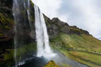 travel to Iceland - view of Seljalandsfoss waterfall of Seljalands River in Katla Geopark on Icelandic Atlantic South Coast in september