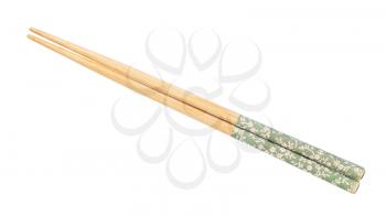 decorated wooden chopsticks put together isolated on white background