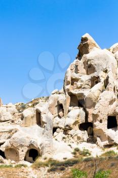 Travel to Turkey - rock-cut ancient cave chapels near Goreme town in Cappadocia in spring
