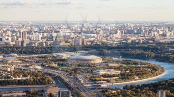 panoramic view of Luzhniki arena stadium and southeast of Moscow city from observation deck at the top of OKO tower in autumn twilight