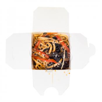 top view of japanese fast food - udon noodles with vegetables in disposable cardboard box isolated on white background