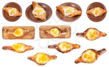 set of various Adjarian boat-shaped khachapuri (caucasian georgian pie with with cheese, butter and egg) isolated on white background