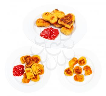 set of fried chicken nuggets on white plate isolated on white background
