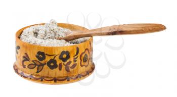 side view of wooden salt cellar with spoon with seasoned salt with spices and dried herbs isolated on white background