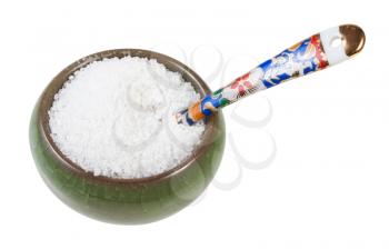 ceramic salt cellar with spoon with grained Rock Salt isolated on white background