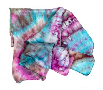 folded head scarf with abstract bright pattern in tie-dye batik technique isolated on white background