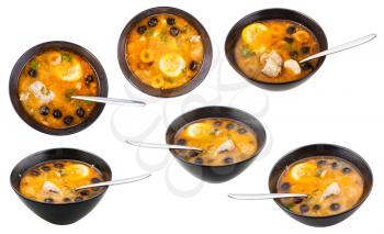 set of bowls with Solyanka russian traditional fat fish soup isolated on white background