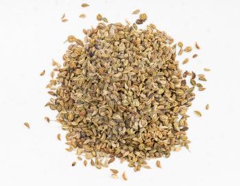 top view of pile of Ajwain seeds close up on gray ceramic plate