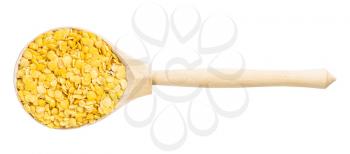 top view of wood spoon with split yellow lentils isolated on white background