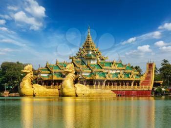 Yangon icon landmark and tourist attraction Karaweik - replica of a Burmese royal barge at Kandawgyi Lake, Yangon, Myanmar Burma