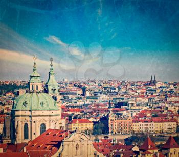 Vintage retro hipster style travel image of aerial view of Prague from Prague Castle. Prague, Czech Republic  with grunge texture overlaid