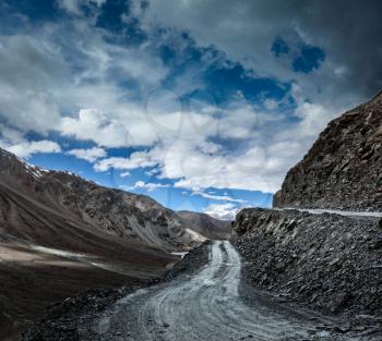 Dirt road in severe unpopulated Himalayas. Spiti valley,  Himachal Pradesh, India