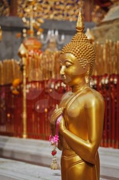 Standing Buddha statue in Wat Phra That Doi Suthep, Chiang Mai, Thailand