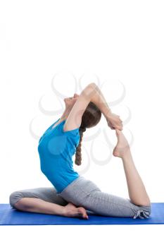 Yoga - young beautiful woman  yoga instructor doing King Pigeon Pose (Raja Kapotasana) exercise
 isolated on white background