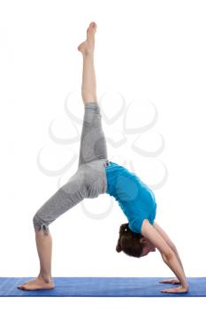 Yoga - young beautiful woman  yoga instructor doing Wheel Pose with one leg lifted straight up (Eka Pada Chakrasana) exercise isolated on white background