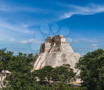 Anicent mayan pyramid (Pyramid of the Magician, Adivino) in Uxmal, Mérida, Yucatán, Mexico